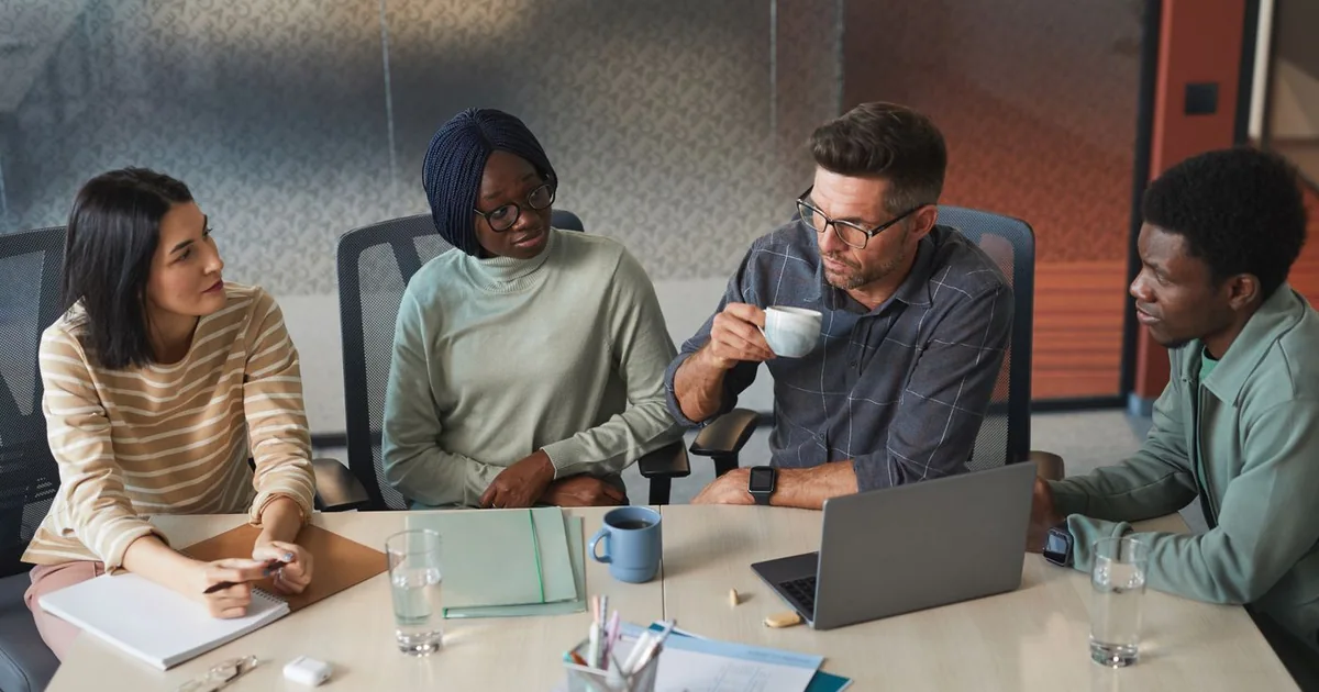Colleagues discussing a shared business project