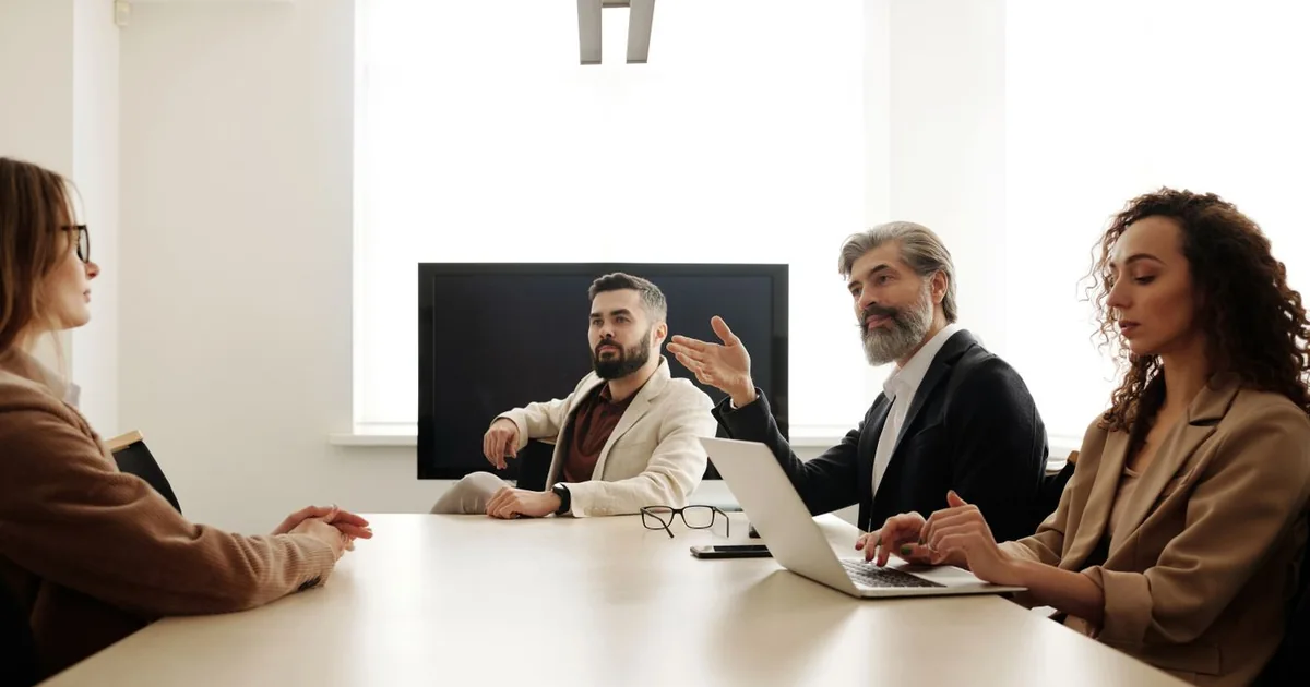 Professionals discussing business strategy in an office