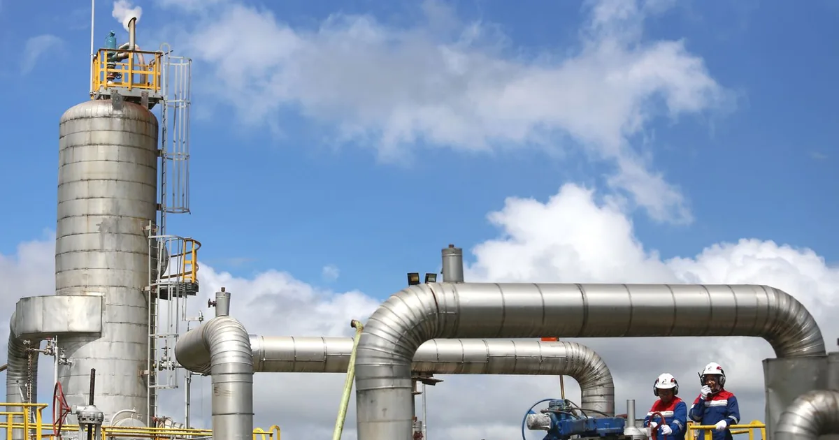 Engineers working at an industrial gas facility