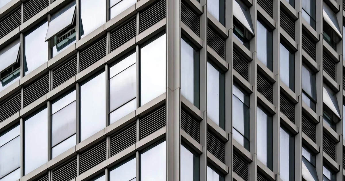 Reflective glass windows on a modern office building